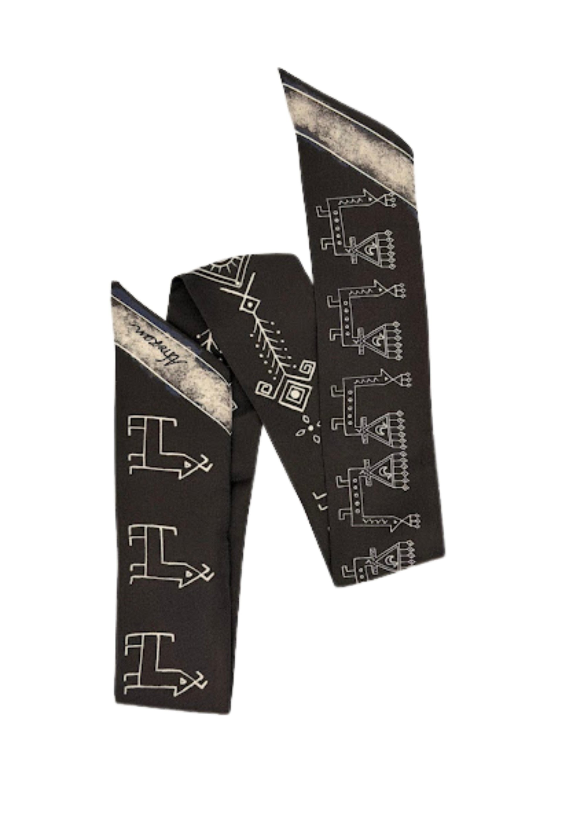 Black scarf with white geometric pattern on a white background