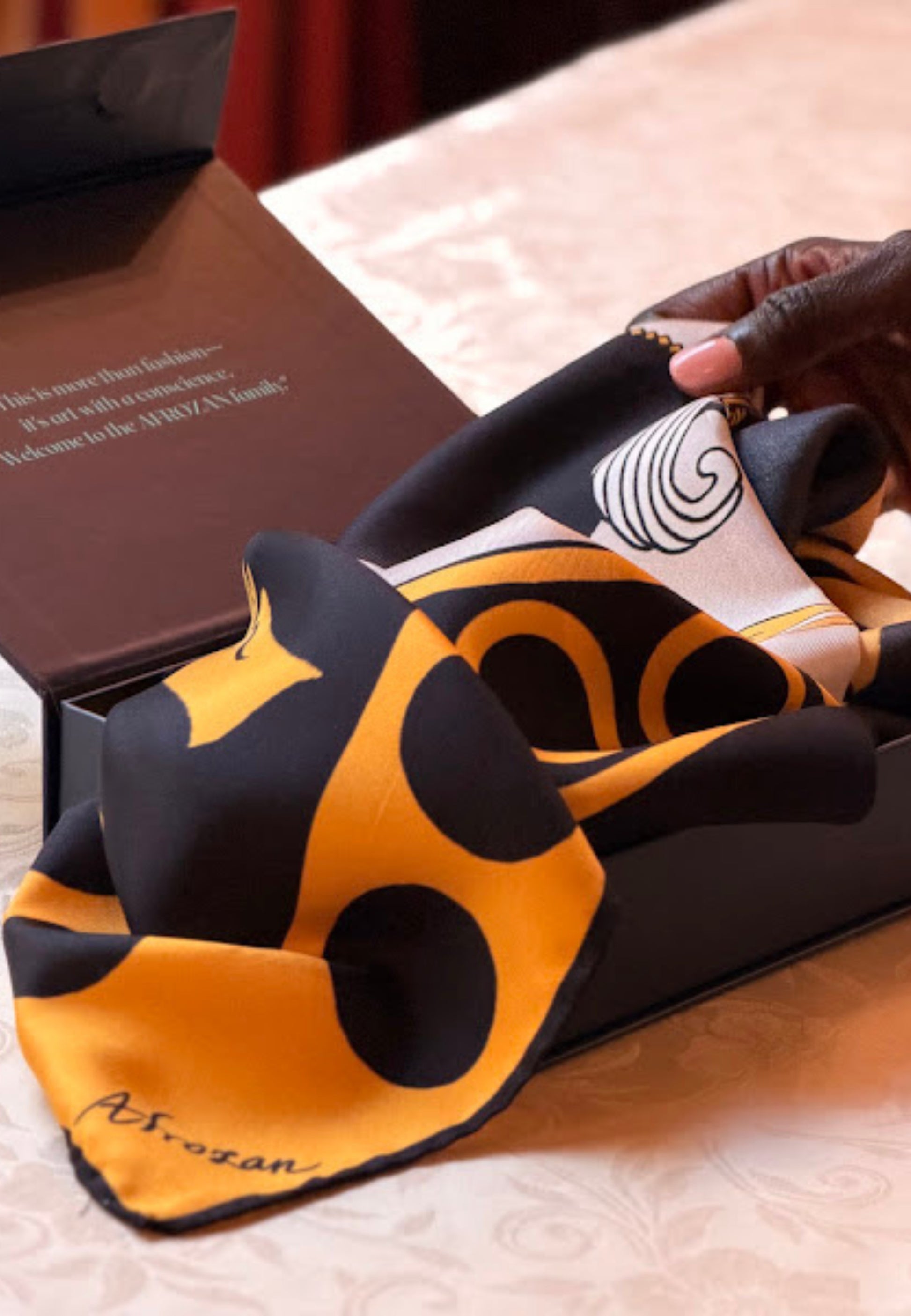 Black and yellow patterned scarf with made in italy , 100% silk